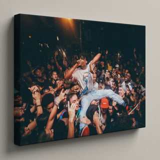 Energetic Rap Concert Crowd Surfing